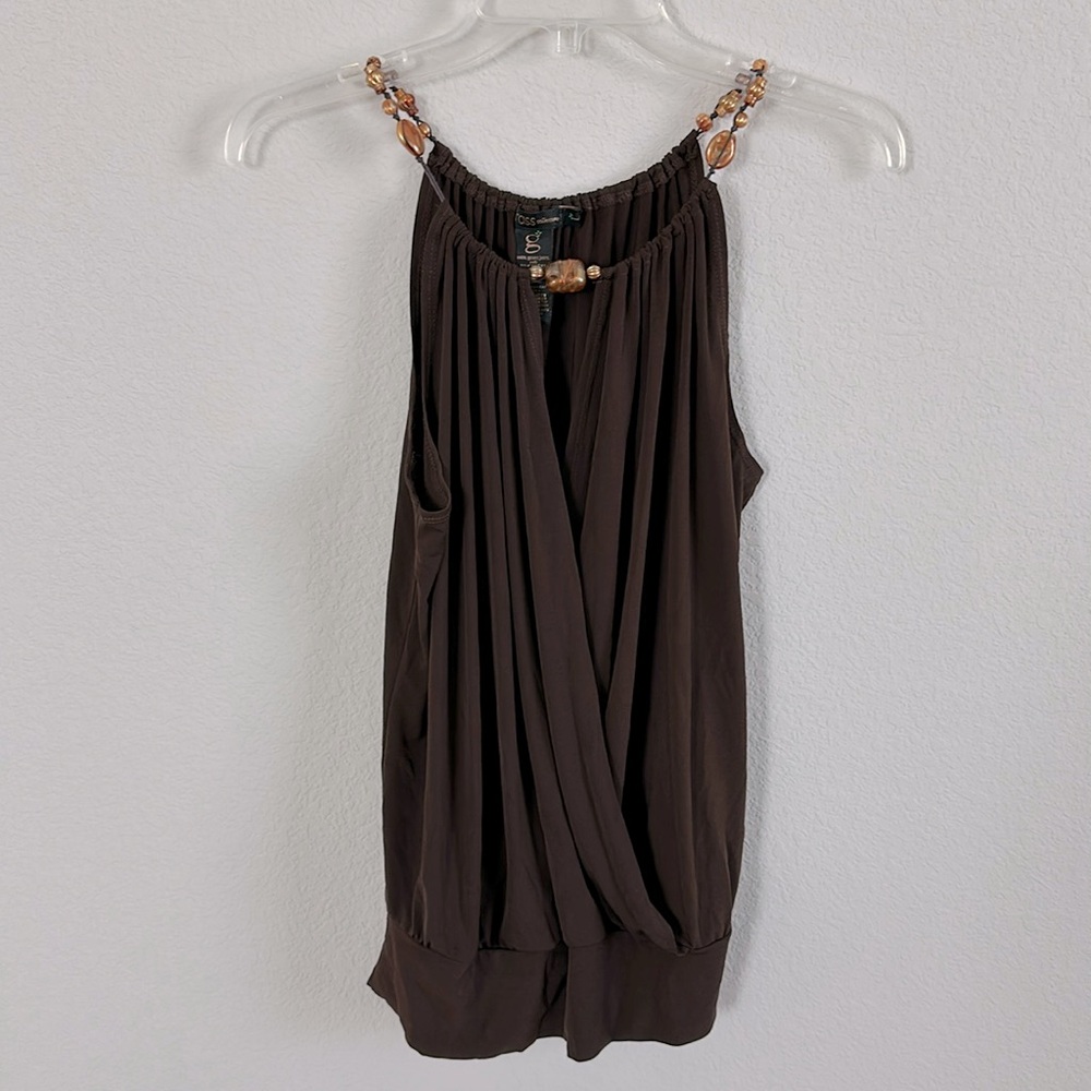 Women Brown sleeveless top with rock details. Size M